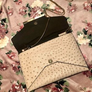 Ostrich tan hand bag with gold hardware and chain